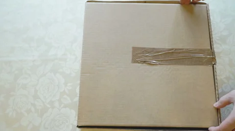 Hands opening the cardboard box of pizza Stock Footage 63353645