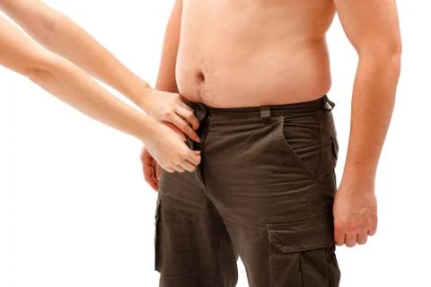 Hands opening or closing man's placket Stock Photos