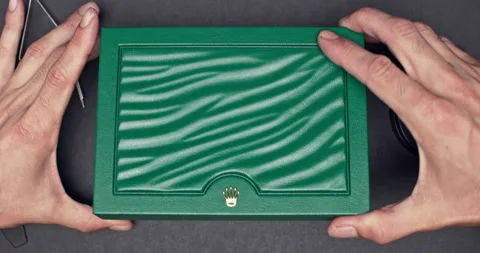 Hands opening Rolex Submariner Box Video stock 266223743