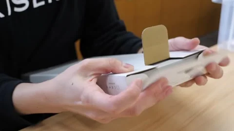 Hands Opening a Slim Presentation Box with a Kitchen Knife Stock Footage 340900374