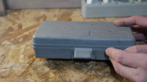 Hands opening textured plastic tool case Vídeo Stock 342866893