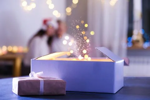 Hands opens gift, miracles and wishes come true, Christmas Foto stock