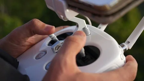 Hands Operating Drone Remote Controller with Joystick 库存影片 74418532