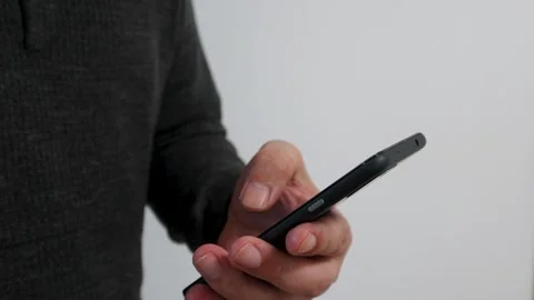 Hands operating a smartphone Stock Footage 234282119