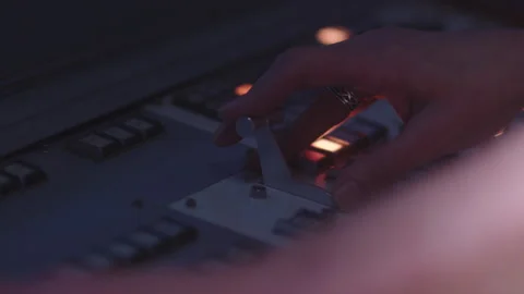 HANDS OPERATING VISION MIXER Stock Footage 140783900