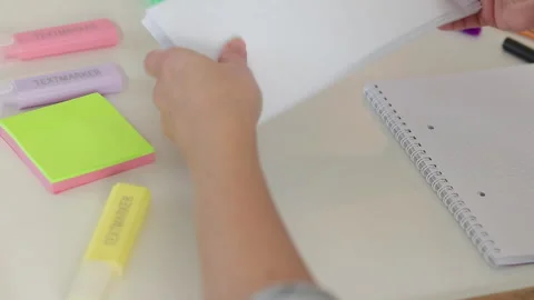 Hands organizing office supplies on white table Stock Footage 331508889