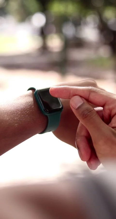Hands, outdoor and check smart watch for fitness, heart rate or scroll Stock Footage 340750076