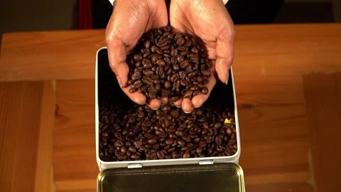 Hands Over Coffee Beans Video stock 318303215