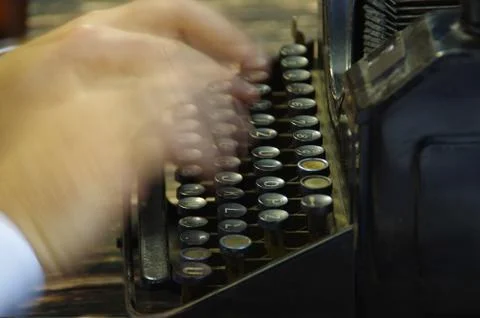 Hands over writing machine Stock Photos