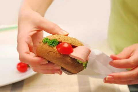 Hands pack up sandwich Stock Photos