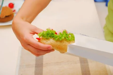 Hands pack up sandwich Stock Photos