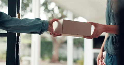 Hands, package and courier with delivery man, supply chain and logistics with Stock Footage 316882604
