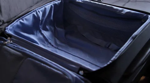 Hands Packing Clothes In A Hurry, Panic, Trolley, Suitcase, Luggage, Side Stock Footage 40899539