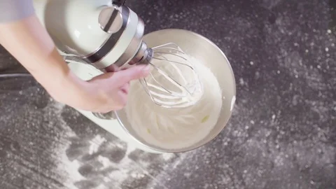 Hands of a pastry chef checking whipped cream Video stock 98041928