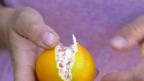 Hands Peel Tangerine (Mandarin) Stock Footage 98944151