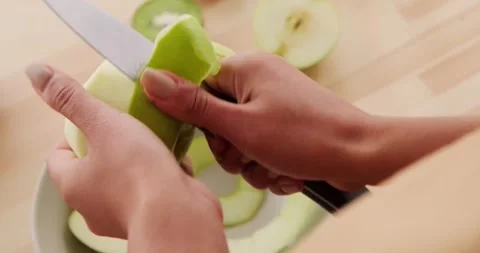 Hands Peeling Fresh Green Apple with Knife Stock Footage 315064223