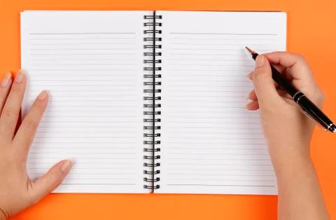 Hands, pen and notebook Stock Photos