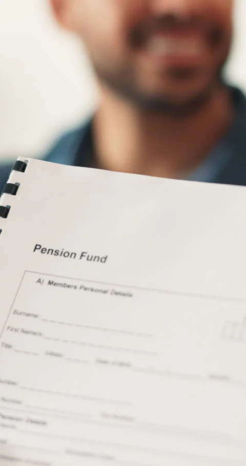 Hands, people and application on document for pension fund, required information 库存影片 340882465