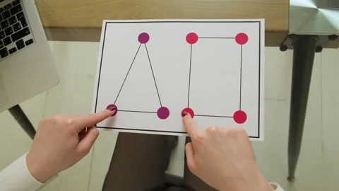 Hands performing brain activation exercise called Triangle and Square using Stock Footage 307588226