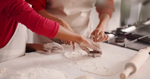 Hands, person and baking dough with child for learning, prepare pastry and Stock Footage 314148240