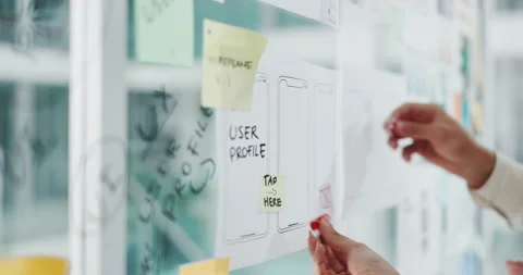 Hands, person and notes on glass in office with ux design, ui layout and Stock Footage 318227488