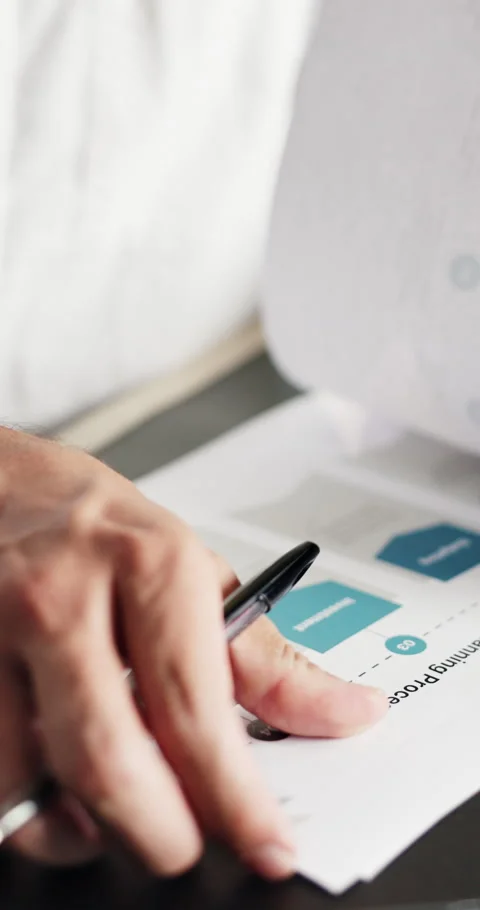 Hands, person and reading with document in office for marketing, analysis and Stock Footage 330923277