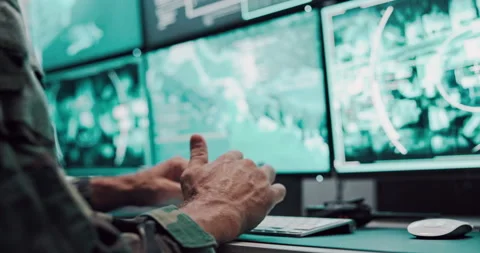 Hands, person and typing on computer screen in control room, military safety and Stock Footage 303557780