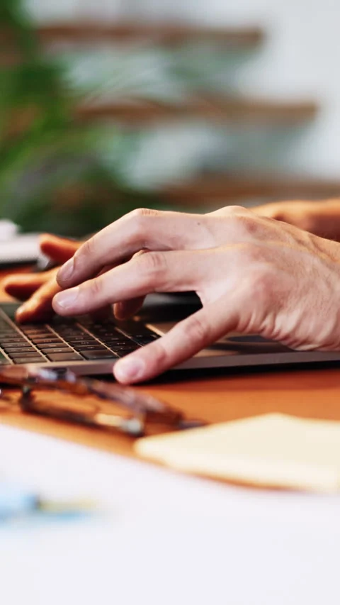 Hands, person and typing with laptop in office for research, editing article and Stock Footage 333243545