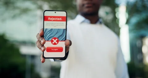 Hands, person or phone screen with reject message in city, online banking or Stock Footage 334054913