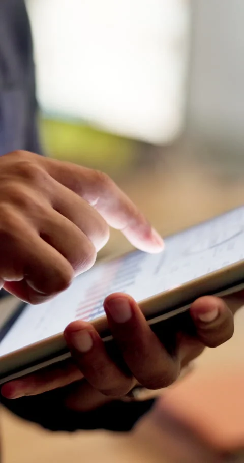 Hands, person or scroll on tablet screen in office for ad results, KPI data or Stock Footage 335791163