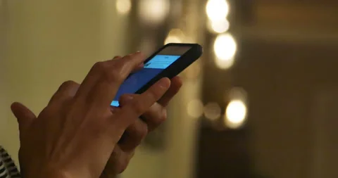 Hands of a person using a mobile phone Stock Footage 152752224
