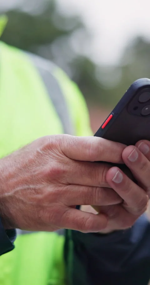 Hands, phone and construction worker on site for feedback on maintenance Stock Footage 340951966