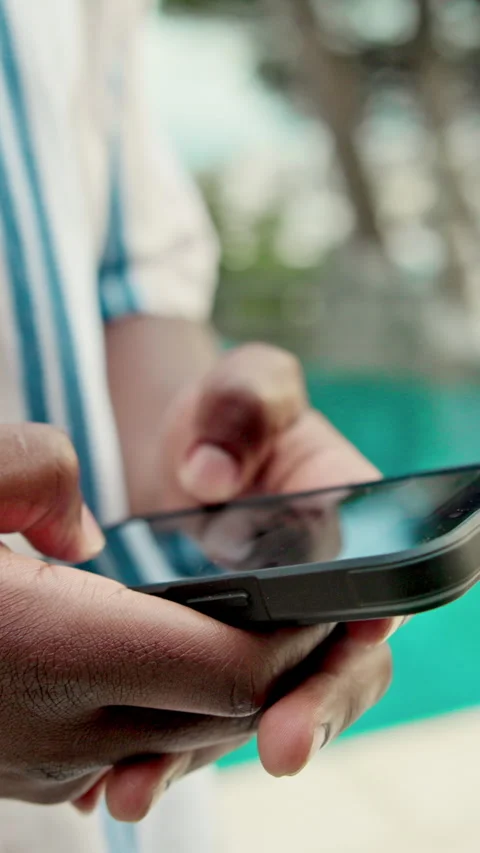 Hands, phone and holiday with pool for travel, weekend and scroll break. Hotel, Stock Footage 332914829