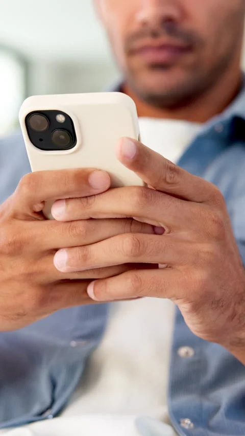Hands, phone and relax with texting in home for contact, web chat and connection Stock Footage 335261310