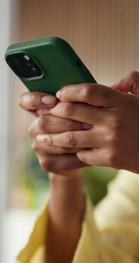 Hands, phone and texting with contact at startup, typing and project for graphic Stock Footage 334311633