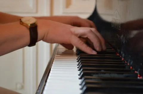 Hands of the pianist Stock Photos