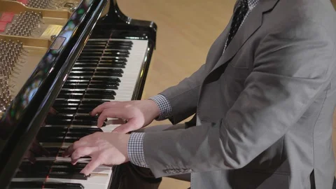 Hands on Piano Keys, Music Performance Pianist Playing Classical Grand Piano Video stock 129524764