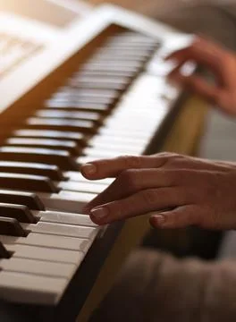 Hands on piano Stock Photos