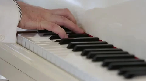 The hands of a piano playing guy Stock Footage 66443324