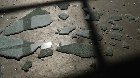Hands Pick Up The Pieces of Broken Tempered Glass, Glass is Falling Down the Stock Footage 53013031