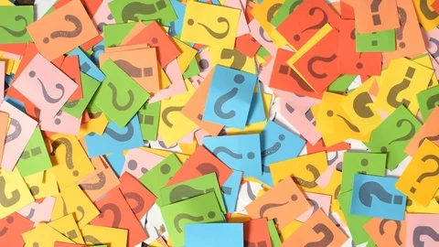 Hands picking up question mark Stock Footage 88468993