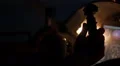 Hands of pilot navigating aircraft, night sky seen through glass, cockpit panel HD Footage
