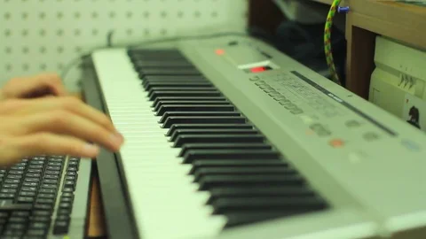 Hands play the keyboard Stock Footage 73847179