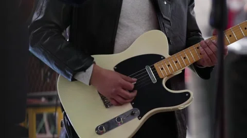 Hands playing aelectric guitar at a live concert. Stock Footage 221662067