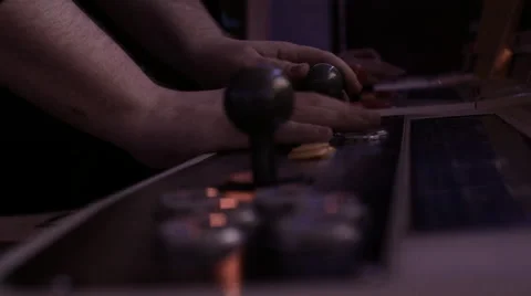 Hands playing Arcade Machine buttons Video stock 53421612