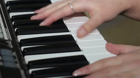 Hands playing the Video stock 61262401