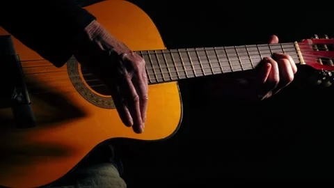 Hands playing guitar close up shot Stock Footage 312319643