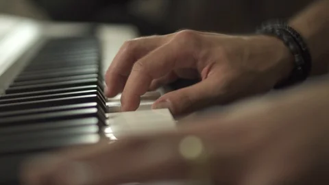 Hands playing the keyboard Stock Footage 111384411