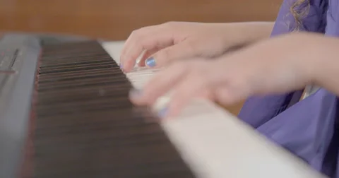 Hands playing piano close up focus pull Stock Footage 50688445