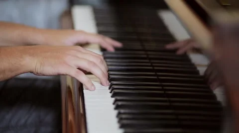 Hands playing the piano (close-up) Video stock 56869551
